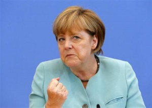 German Chancellor Angela Merkel gestures as she address media during a news conference at Bundespressekonferenz in Berlin July 19, 2013. REUTERS/Tobias Schwarz