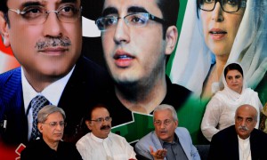 Opposition Pakistan People's Party (PPP) Senator Raza Rabbani (2nd R, seated), a candidate for the country's upcoming presidential election, speaks while flanked by party leaders Ameen Fahim (2nd L), Aitzaz Ahsan (L) and Khurseed Shah (R) during a news conference in Islamabad on July 26, 2013. Pakistan's main opposition party announced July 26 it would boycott next week's presidential election to protest against the vote being brought forward without consultation. The Supreme Court ruled Wednesday that the ballot would be held on July 30 instead of August 6 after the main ruling party complained that the original date clashed with the end of Ramadan. AFP PHOTO / AAMIR QURESHI
