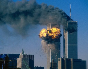 1966-1973, Financial District, New York, New York, USA --- The World Trade Center south tower (L) burst into flames after being struck by hijacked United Airlines Flight 175 as the north tower burns following an earlier attack by a hijacked airliner in New York City September 11, 2001. The stunning aerial assaults on the huge commercial complex where more than 40,000 people worked on an ordinary day were part of a coordinated attack aimed at the nation's financial heart. They destroyed one of America's most dramatic symbols of power and financial strength and left New York reeling.   FOURTH OF SEVEN  PHOTOGRAPHS                                    REUTERS/Sean Adair --- Image by © Sean Adair/Reuters/CORBIS